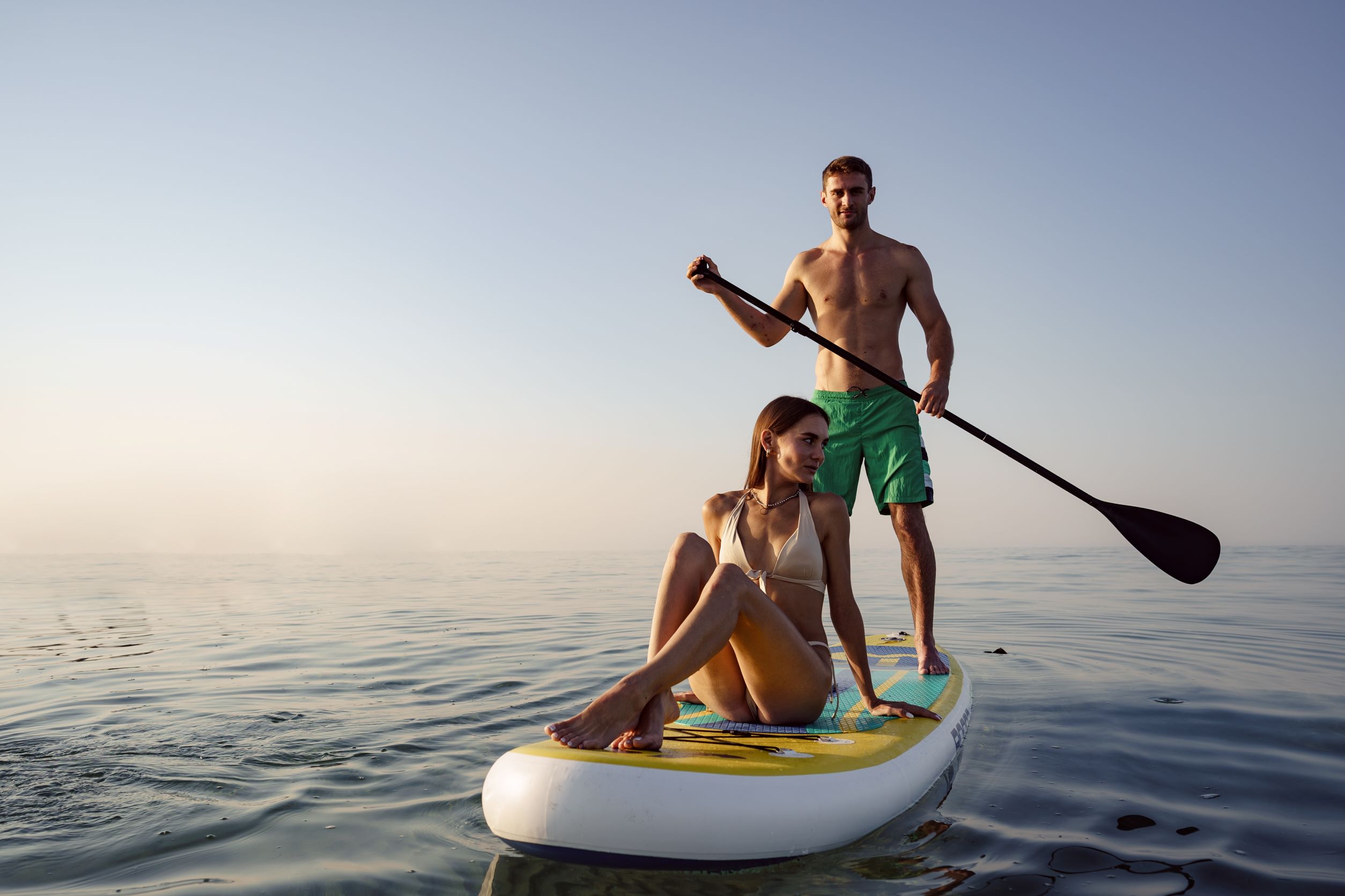 Two people on a paddleboard