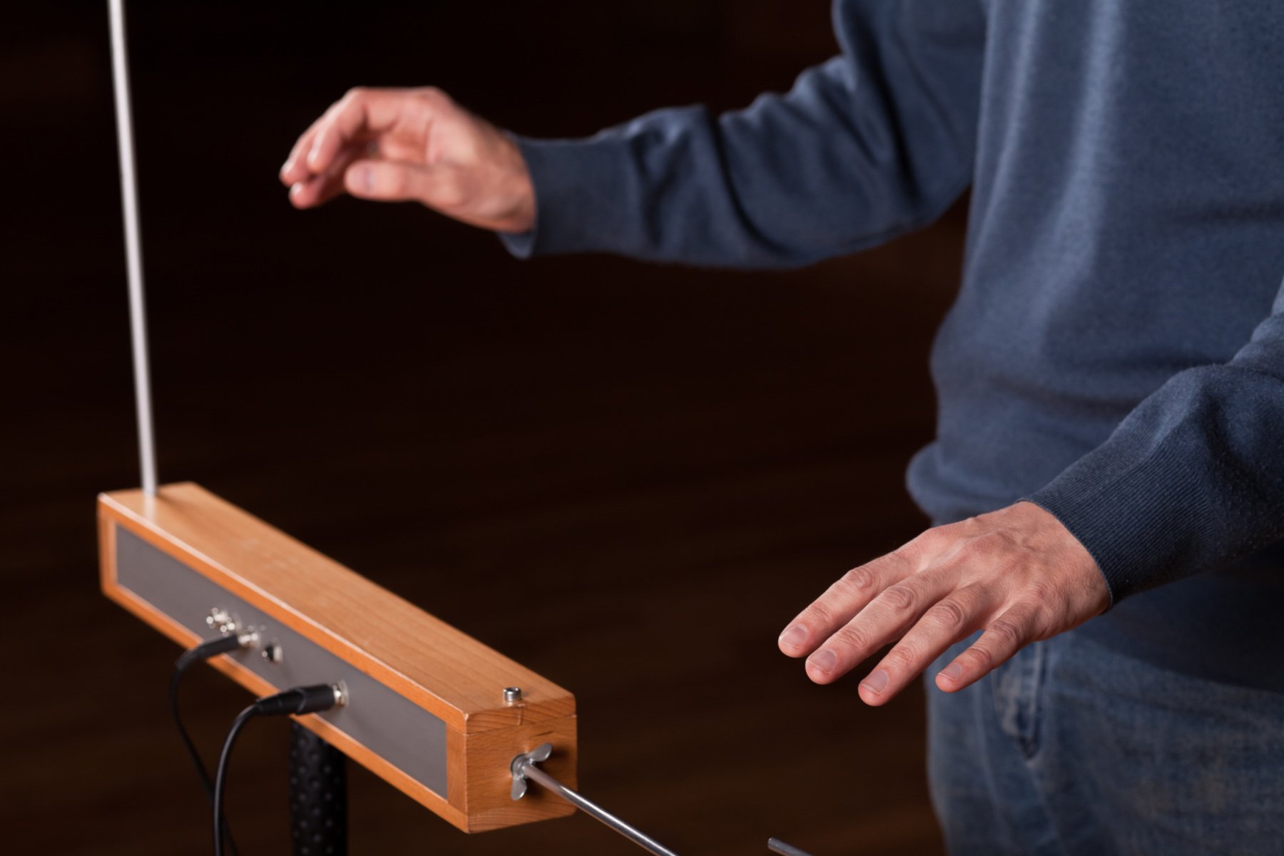 man playing the theremin