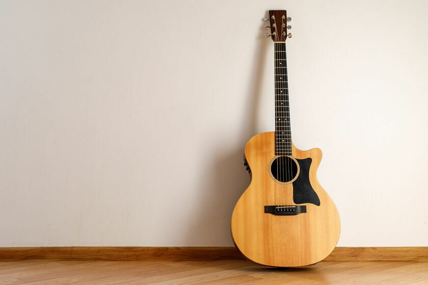 Comment choisir une guitare acoustique Muziker