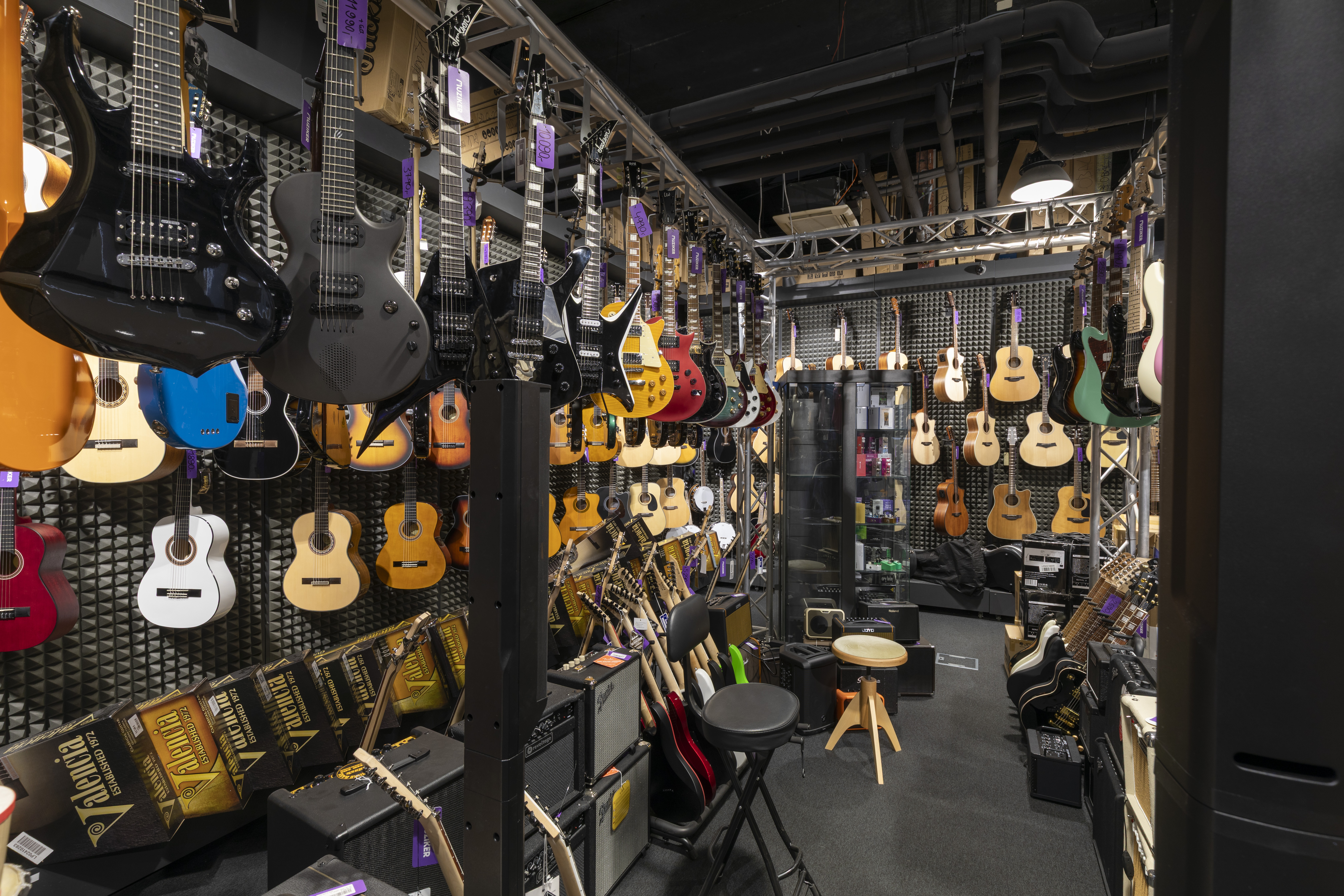 Musical instruments in music shop Muziker Liberec.