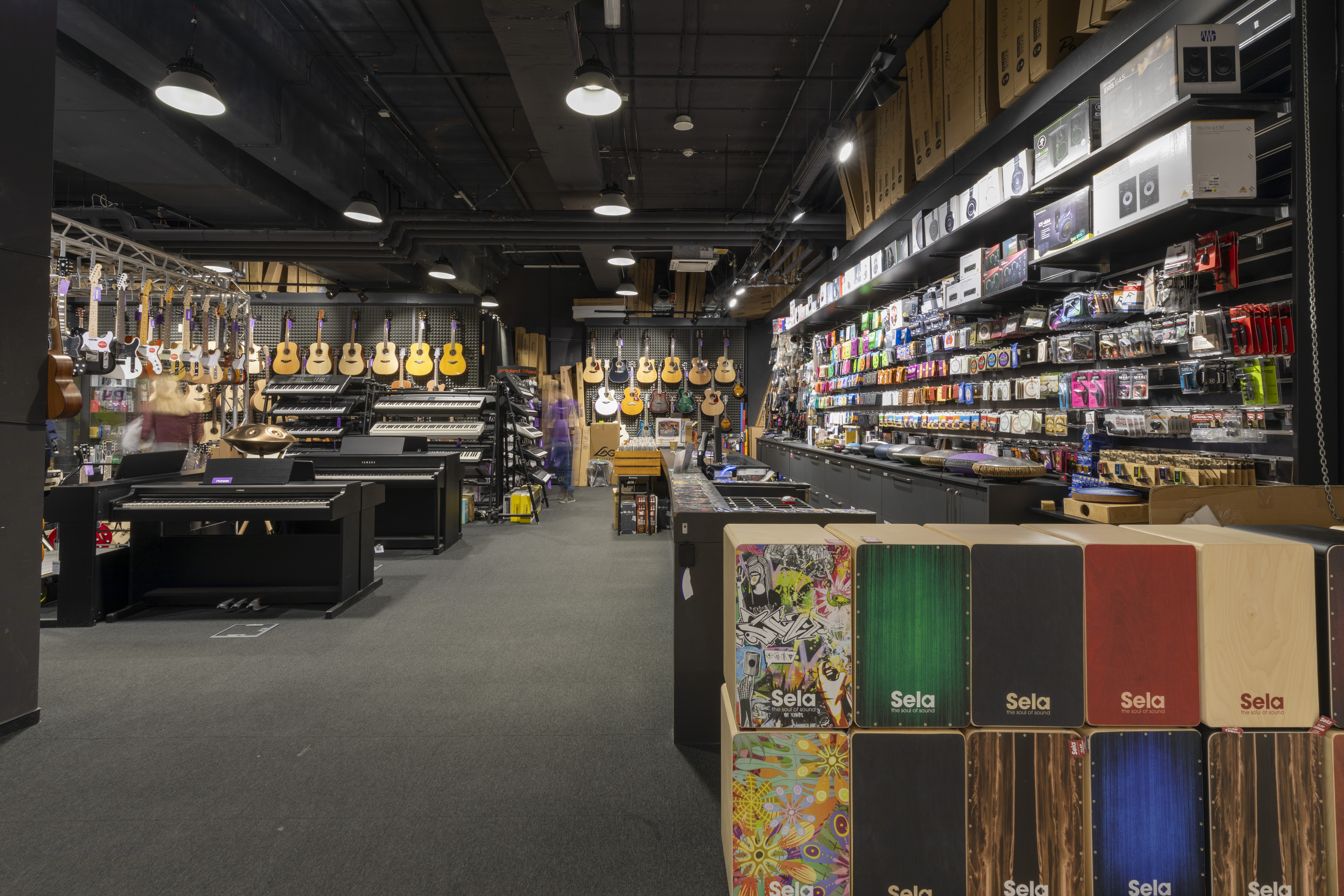 Musical instruments in music shop Muziker Liberec.