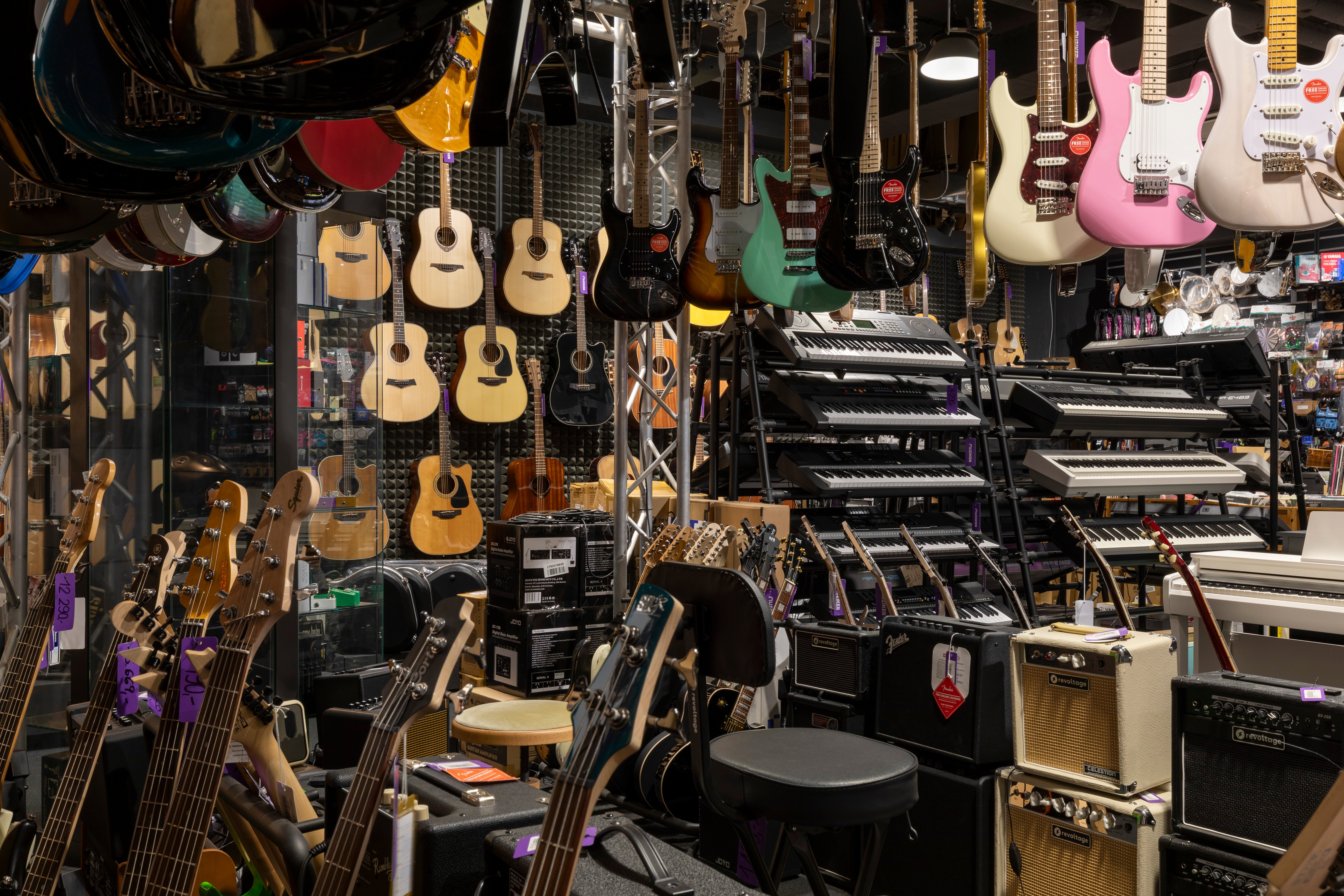 Musical instruments and accessories in music shop Muziker Liberec.