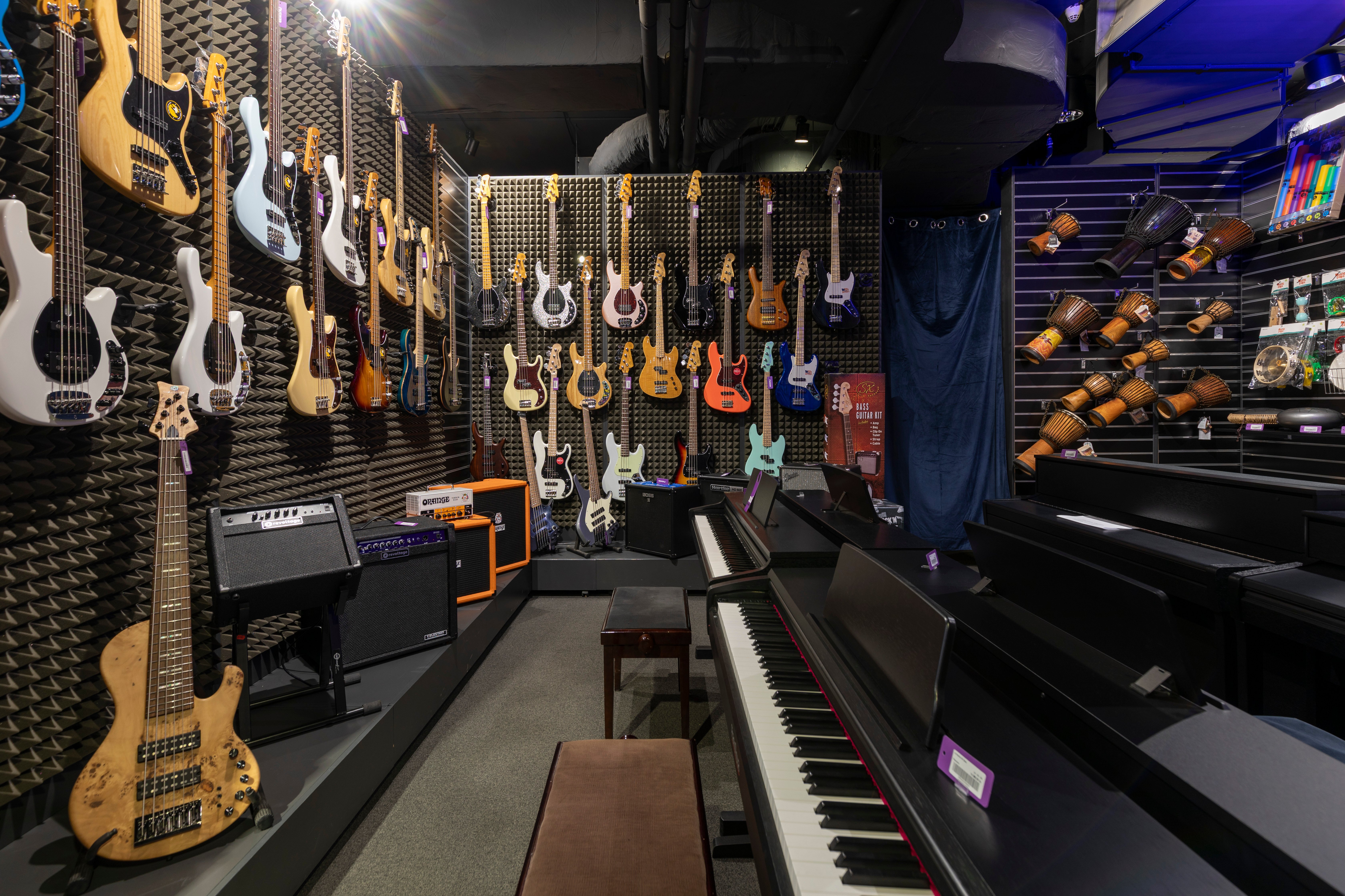 Guitars and accessories in musical instruments shop Muziker Prague – Smíchov