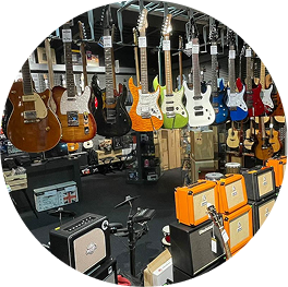 Showroom mit Musikinstrumenten – Muziker