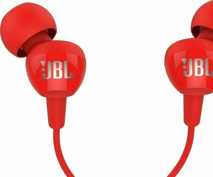 En la oreja los auriculares JBL C100SI Red - 2