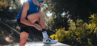 Tekaške nogavice
 Compressport Mid Compression V2.0 White/Black T2 Tekaške nogavice - 4