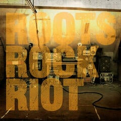 Disco in vinile Skindred - Roots Rock Riot (Yellow With Black Splatter Vinyl) (LP + 7"  Vinyl)