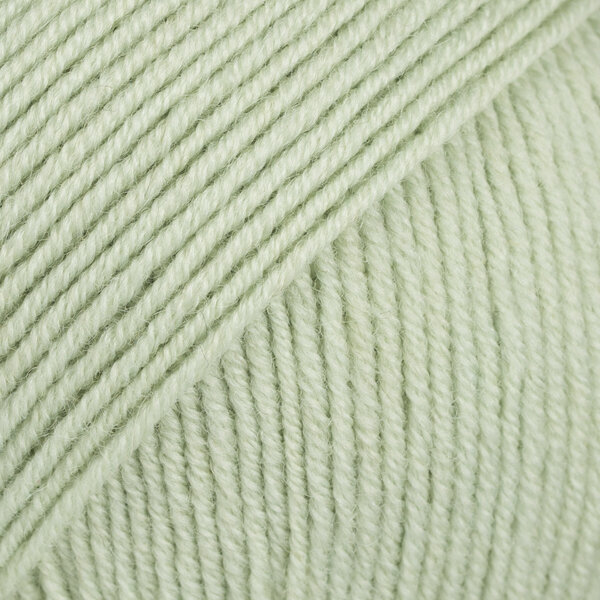 Fire de tricotat Drops Baby Merino Uni Colour 58 Pistachio Ice Cream Fire de tricotat