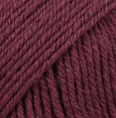 Fios para tricotar Drops Karisma Uni Colour 83 Grape Fios para tricotar