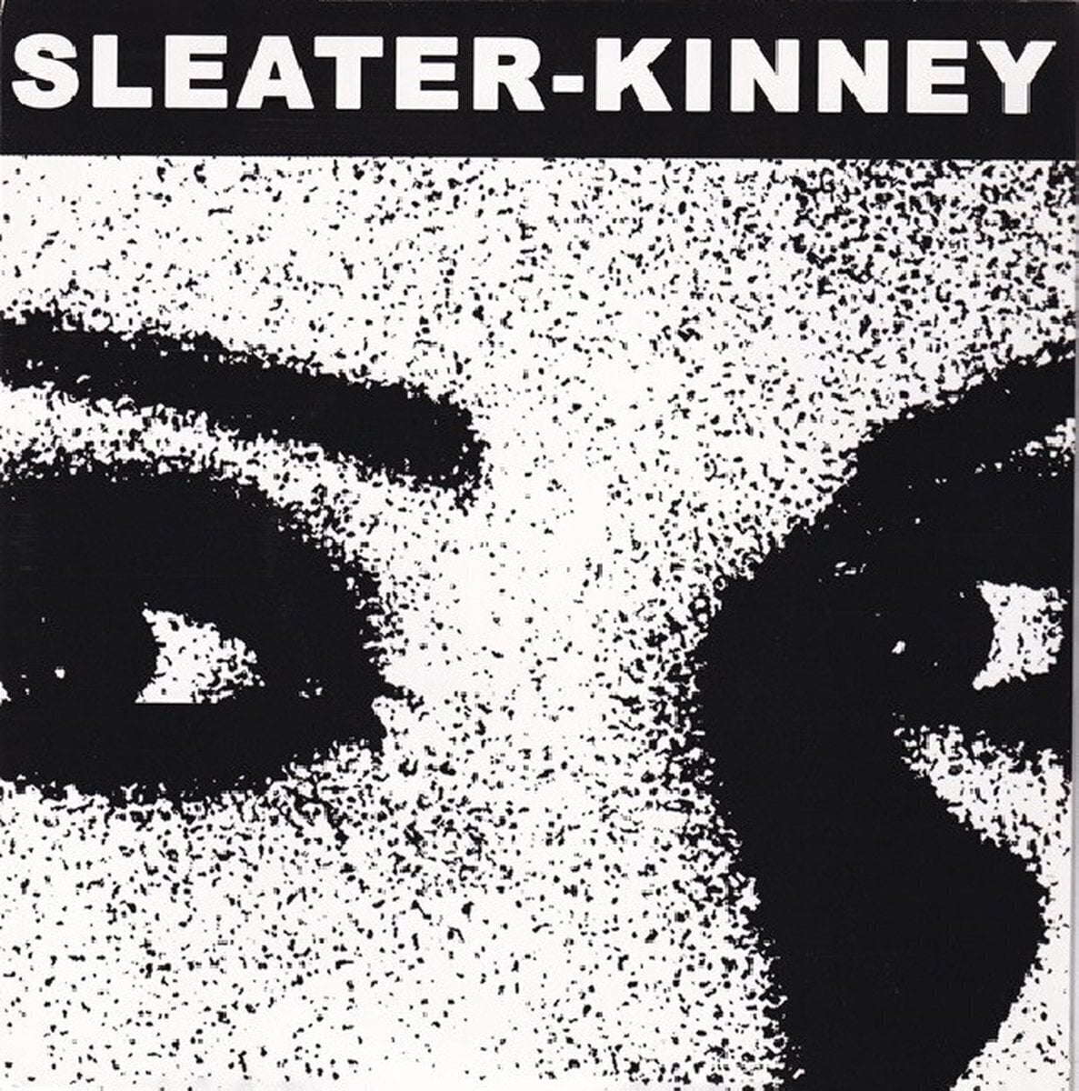 Hanglemez Sleater-Kinney - This Time / Here Today (Limited Edition) (Red Translucent Coloured) (7")