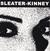 Hanglemez Sleater-Kinney - This Time / Here Today (Limited Edition) (Red Translucent Coloured) (7")