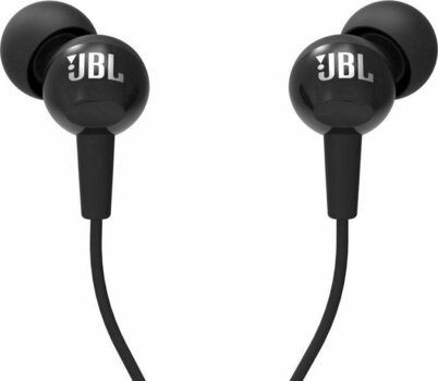 En la oreja los auriculares JBL C100SI Black - 1
