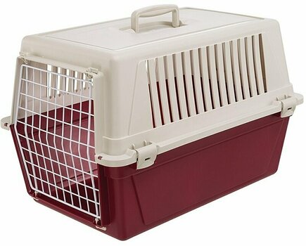 pink plastic dog crate
