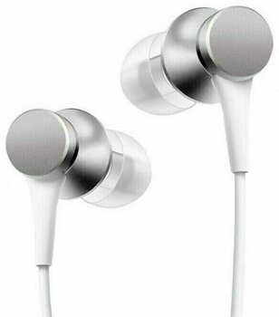 En la oreja los auriculares Xiaomi Mi In-Ear Headphones Basic Silver - 1